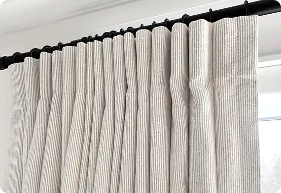 Light fabric pinch pleat drapes